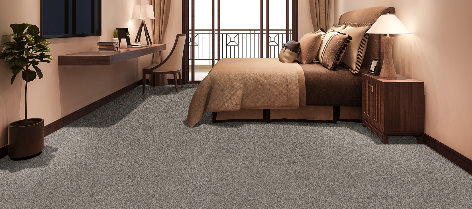 Frequency and Transmission cut-pile carpet in Canyon, a textured gray tone, installed in a modern bedroom.